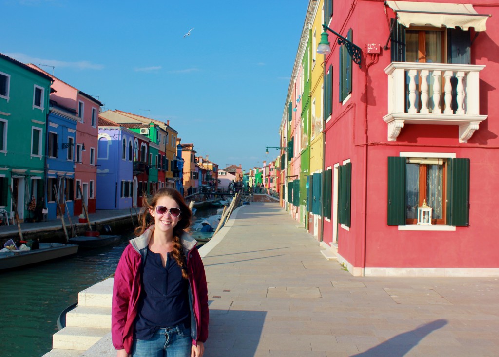 Soaking in the scenery of Burano, the lace making island in Venice famous for its colorful houses