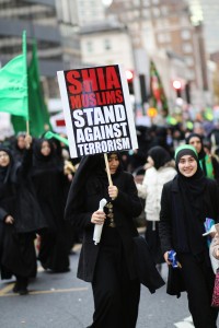 Shia muslims walk in an Ashura Day processional, London, England