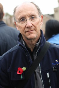 Visitor at the Tower of London Poppy Memorial on Remembrance Day, London, England (November, 2015)